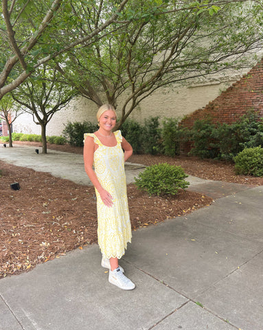 Yellow eyelet sun dress.